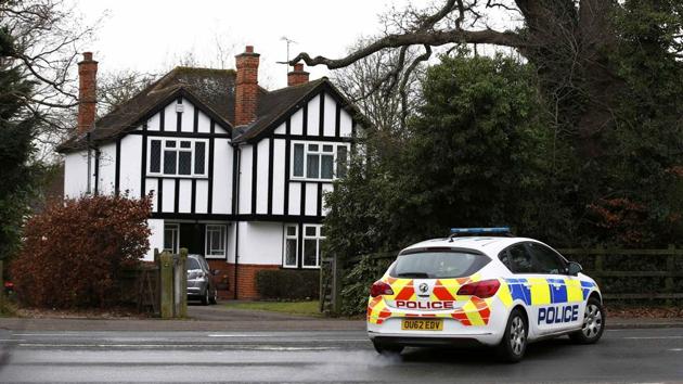 A police car drives past an address which has been linked by local media to former British intelligence officer Christopher Steele, who has been named as the author of an intelligence dossier on President-elect Donald Trump, in Wokingham, Britain. (REUTERS) A police car drives past an address which has been linked by local media to former British intelligence officer Christopher Steele, who has been named as the author of an intelligence dossier on President-elect Donald Trump, in Wokingham, Britain. (REUTERS)