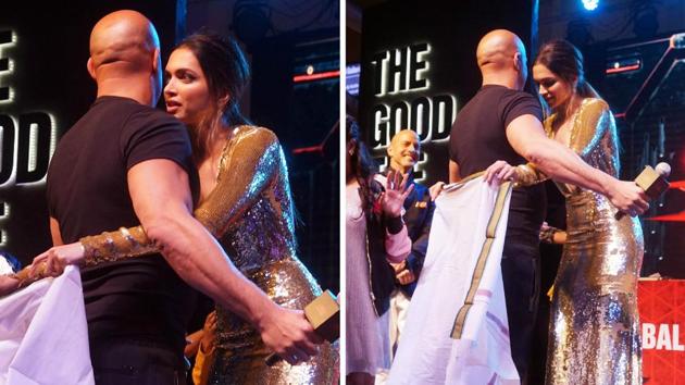 When in India, do like the Indians. Deepika ties a lungi for Vin Diesel. (Prodip Guha/HT PHOTO) When in India, do like the Indians. Deepika ties a lungi for Vin Diesel. (Prodip Guha/HT PHOTO)