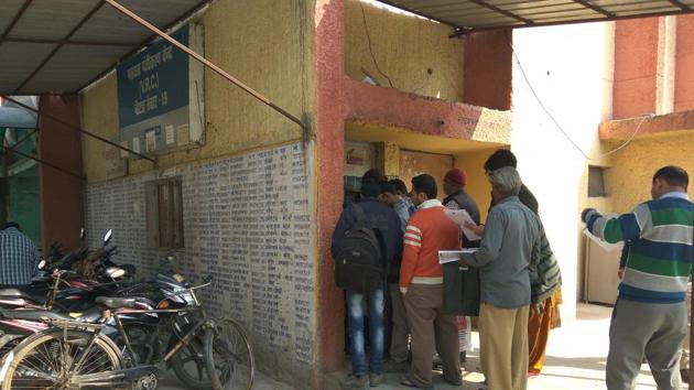 Confused voters were seen running between booths and voter registration centre in Noida. Confused voters were seen running between booths and voter registration centre in Noida.