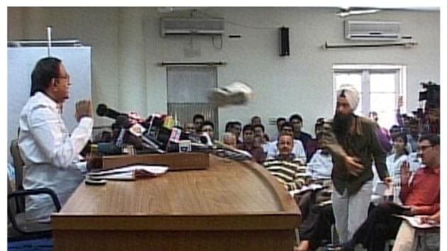 A journalist throws his shoe at India's Home Minister P Chidambaram during a news conference in New Delhi in this combo picture made from two video frame grabs from ANI TV taken and released in 2009. In 2017, the journalist is fighting the assembly polls in Punjab on an Aam Aadmi Party ticket and taking on chief minister Parkash Singh Badal, who was the victim of a shoe-throwing incident on Wednesday.(REUTERS)