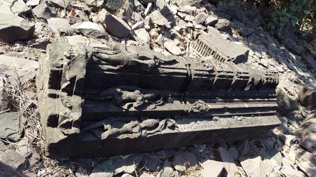 Remnants of temples - statues, lintels and gorgeous pillars like this one - have been discovered. They’re just strewn along the forest leaves. (Rachel Lopez/HT Photo) 
