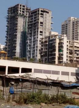 Two of the many buildings that stand unfinished in Kharghar. “With demonetisation, buyers are in wait-and-watch mode. People are waiting for home loan rates to drop, and other policy changes to kick in, so work has been affected accordingly in places,” says Pankaj Kapoor, director of real estate research firm Liases Foras. Experts estimate it will take about six months for normalcy to return post-demonetisation. The new normal will likely look good for the buyer, since the aim is to reduce the black money in the realty market and bring prices down, but for construction labourers, this will continue to be a difficult period. (Dipanjan Sinha / HT Photo) Two of the many buildings that stand unfinished in Kharghar. “With demonetisation, buyers are in wait-and-watch mode. People are waiting for home loan rates to drop, and other policy changes to kick in, so work has been affected accordingly in places,” says Pankaj Kapoor, director of real estate research firm Liases Foras. Experts estimate it will take about six months for normalcy to return post-demonetisation. The new normal will likely look good for the buyer, since the aim is to reduce the black money in the realty market and bring prices down, but for construction labourers, this will continue to be a difficult period. (Dipanjan Sinha / HT Photo)