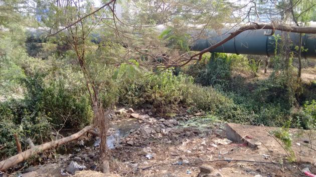 “I wake up at 6am to cook dinner,” Mukhia says. His only source of water to wash is seepage from this municipal pipe and to cook and drink he uses water used for sprinkling on gardens. Some of the workers live in slum rooms, at a rent of Rs 3,000 to Rs 4,000 per head. He gave up his spot in a room when he went home, and hasn’t been able to afford the rent since his return to Navi Mumbai. In the slums, there was electricity and a common tap. Here there is neither. (Bachchan Kumar / HT Photo) “I wake up at 6am to cook dinner,” Mukhia says. His only source of water to wash is seepage from this municipal pipe and to cook and drink he uses water used for sprinkling on gardens. Some of the workers live in slum rooms, at a rent of Rs 3,000 to Rs 4,000 per head. He gave up his spot in a room when he went home, and hasn’t been able to afford the rent since his return to Navi Mumbai. In the slums, there was electricity and a common tap. Here there is neither. (Bachchan Kumar / HT Photo)