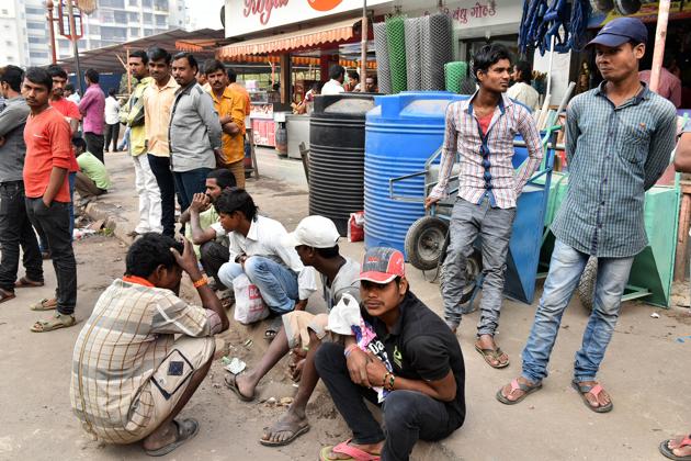 Every morning, he joins the crowd of more than 100 workers that gather at Shivaji Chowk, also known as Labour Chowk, in Sector 12 of Khaghar. They congregate around 8 30 am and wait till lunch time. “Before November, we would all find work by 9 am. This chowk would be empty after that. And we would come back in the evening and get hired for night shifts too, with double the pay,” Mukhia says. The numbers have dwindled as some workers have given up and gone home to West Bengal, Bihar, UP, Andhra Pradesh, Telangana, Karnataka months. “Two months without proper work means you can’t pay for your kholi, or even for food,” says Mukhia. (Bachchan Kumar / HT Photo) Every morning, he joins the crowd of more than 100 workers that gather at Shivaji Chowk, also known as Labour Chowk, in Sector 12 of Khaghar. They congregate around 8 30 am and wait till lunch time. “Before November, we would all find work by 9 am. This chowk would be empty after that. And we would come back in the evening and get hired for night shifts too, with double the pay,” Mukhia says. The numbers have dwindled as some workers have given up and gone home to West Bengal, Bihar, UP, Andhra Pradesh, Telangana, Karnataka months. “Two months without proper work means you can’t pay for your kholi, or even for food,” says Mukhia. (Bachchan Kumar / HT Photo)