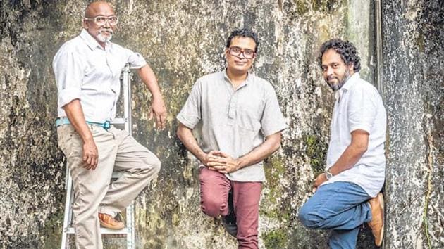 From left: Bose Krishnamachari, Jitish Kallat and Riyas Komu take a break while preparing for the biennale in Kochi. The Kochi Biennale is a fine contemporary illustration of the kind of rooted cosmopolitanism that Indians such as Tagore and Gandhi once practised.(Photo courtesy: Kochi Biennale Foundation) From left: Bose Krishnamachari, Jitish Kallat and Riyas Komu take a break while preparing for the biennale in Kochi. The Kochi Biennale is a fine contemporary illustration of the kind of rooted cosmopolitanism that Indians such as Tagore and Gandhi once practised.(Photo courtesy: Kochi Biennale Foundation)