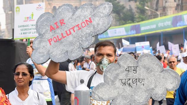 Participants carry placards of social awareness messages during the Dream run. (kunal patil/ht photo) 