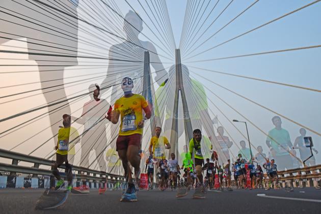 In camera double exposure shot of participants run during the 2017 Mumbai Marathon at Bandra-worli Sealink. (Pratik Chorge/HT PHOTO) 