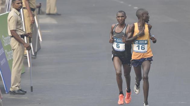 Lead athletes near the finishing point of the  full marathon at CST. (Anshuman Poyrekar/HT PHOTO) 