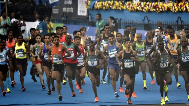 Elite Athletes at the starting point  of the full marathon at CST in Mumbai. (Anshuman Poyrekar/HT PHOTO) 