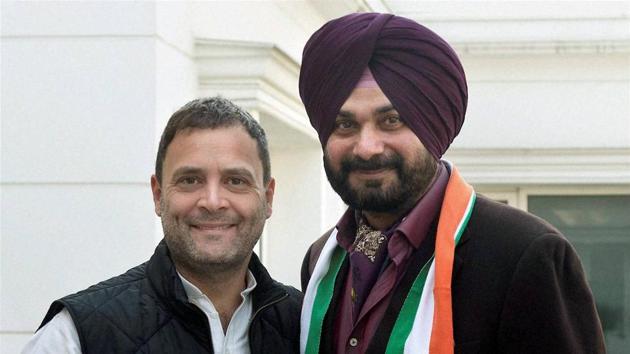 Congress Vice-President Rahul Gandhi welcomes former BJP leader Navjot Singh Sidhu into the party at his residence in New Delhi on Sunday. (PTI Photo) Congress Vice-President Rahul Gandhi welcomes former BJP leader Navjot Singh Sidhu into the party at his residence in New Delhi on Sunday. (PTI Photo)