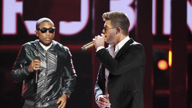 In this June 30, 2013 file photo, Pharrell Williams, left, and Robin Thicke perform onstage at the BET Awards at the Nokia Theatre in Los Angeles. (AP) In this June 30, 2013 file photo, Pharrell Williams, left, and Robin Thicke perform onstage at the BET Awards at the Nokia Theatre in Los Angeles. (AP)