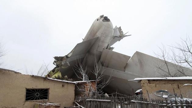 Plane debris is seen at the crash site of a Turkish cargo jet near Kyrgyzstan's Manas airport outside Bishkek.(Reuters)