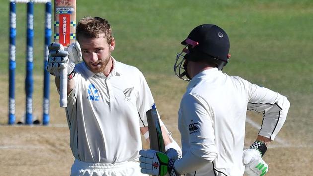 New Zealand's captain Kane Williamson celebrates 100 runs with teammate Henry Nicholls during day five of the first Test against Bangladesh at the Basin Reserve in Wellington on Monday. (AFP) New Zealand's captain Kane Williamson celebrates 100 runs with teammate Henry Nicholls during day five of the first Test against Bangladesh at the Basin Reserve in Wellington on Monday. (AFP)