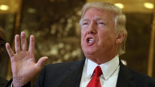 File photo of US president-elect Donald Trump speaking with reporters in the lobby of Trump Tower in New York. (AP) File photo of US president-elect Donald Trump speaking with reporters in the lobby of Trump Tower in New York. (AP)