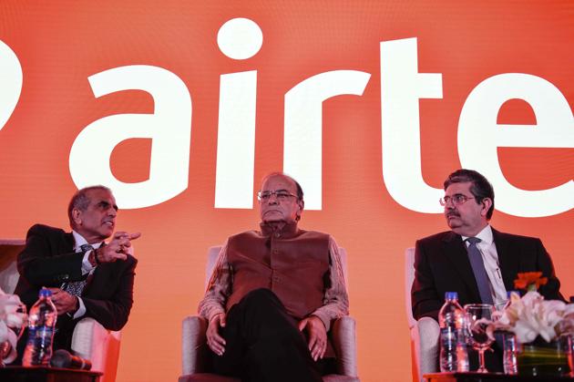 Founder and Chairman of Bharti Enterprises, Sunil Bharti Mittal,(L), Union Finance Minister, Arun Jaitley (C) and vice chairman and managing director of Kotak Mahindra Bank, Uday Kotak look on during the launch of Airtel payment banks. (AFP) Founder and Chairman of Bharti Enterprises, Sunil Bharti Mittal,(L), Union Finance Minister, Arun Jaitley (C) and vice chairman and managing director of Kotak Mahindra Bank, Uday Kotak look on during the launch of Airtel payment banks. (AFP)