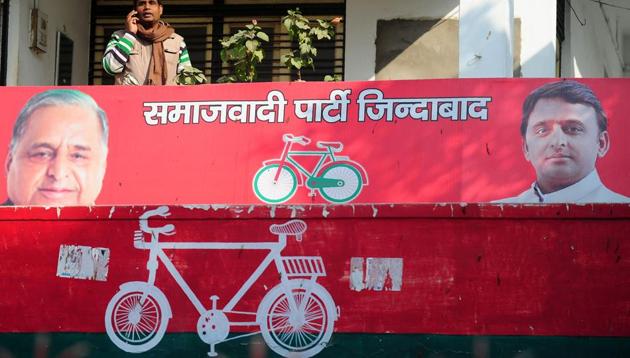 A party worker of India's Samajwadi Party stands on the balcony of a Samajwadi Party office adorned by the present party symbol a bicycle in Allahabad. (AFP Photo) A party worker of India's Samajwadi Party stands on the balcony of a Samajwadi Party office adorned by the present party symbol a bicycle in Allahabad. (AFP Photo)
