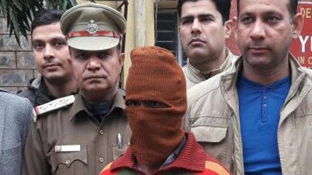 Sunil Rastogi in police custody. (HT Photo) Sunil Rastogi in police custody. (HT Photo)