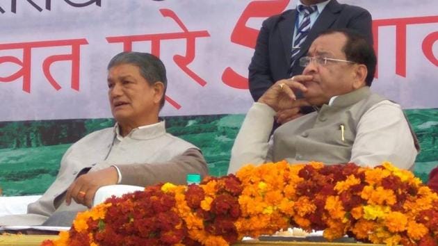 Yashpal Arya (right) is the 11th Congress legislator to leave the party in less than a year’s time. (HT File Photo) Yashpal Arya (right) is the 11th Congress legislator to leave the party in less than a year’s time. (HT File Photo)