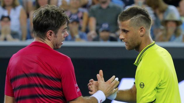 Stan Wawrinka shakes hands after winning against Slovakia's Martin Klizan in their Rd 1 match of Australian Open(REUTERS) Stan Wawrinka shakes hands after winning against Slovakia's Martin Klizan in their Rd 1 match of Australian Open(REUTERS)