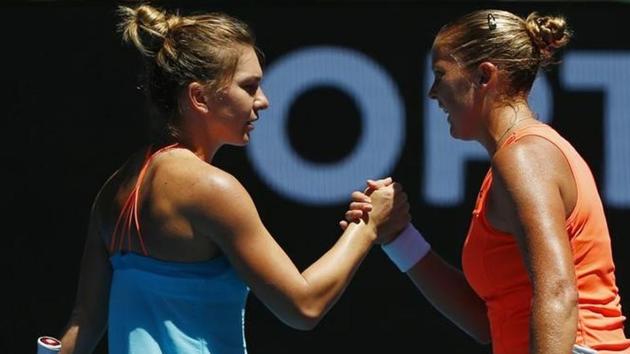 Shelby Rogers of the U.S. shakes hands after winning her women's singles Australian Open first round match against Romania's Simona Halep (right) at Melbourne Park.(Reuters) Shelby Rogers of the U.S. shakes hands after winning her women's singles Australian Open first round match against Romania's Simona Halep (right) at Melbourne Park.(Reuters)