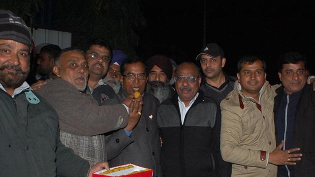 MLA Som Prakash celebrating with his supporters in Jalandhar on Monday.(Pardeep Pandit/HT photo)