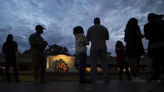 People visit the tomb of the Rev. Martin Luther King Jr. and his wife Coretta Scott King. (Branden Camp/AP) People visit the tomb of the Rev. Martin Luther King Jr. and his wife Coretta Scott King. (Branden Camp/AP)