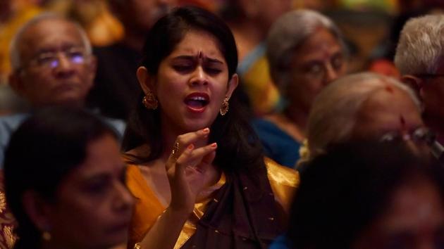 A woman immersed herself in the performance. (Anshuman Poyrekar/HT PHOTO) 