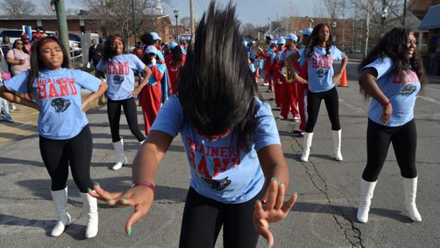 Marki Ash of Brainerd High School's dance team prepares for the annual parade to honour Martin Luther King, in Chattanooga, Tennessee. (Billy Weeks/REUTERS) Marki Ash of Brainerd High School's dance team prepares for the annual parade to honour Martin Luther King, in Chattanooga, Tennessee. (Billy Weeks/REUTERS)