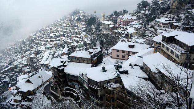 A view of snow covered roofs in city after Shimla receiving second spell of snow on Monday. (Deepak Sansta / HT Photo) A view of snow covered roofs in city after Shimla receiving second spell of snow on Monday. (Deepak Sansta / HT Photo)