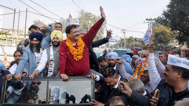 Aam Aadmi Party convener and Delhi CM Arvind Kejriwal during a road show for the upcoming Punjab assembly election in Jalandhar on Friday. (PTI) Aam Aadmi Party convener and Delhi CM Arvind Kejriwal during a road show for the upcoming Punjab assembly election in Jalandhar on Friday. (PTI)