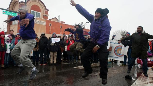 Omega Psi Phi Fraternity members perform ‘We Jump’ while marching down Colfax Avenue in Denver, Colorado during Denver's Martin Luther King Jr. parade. Denver's Martin Luther King Jr. parade is the largest celebration held in honour of the late Dr. Martin Luther King Jr. in the United States. (Jason Connolly/AFP) Omega Psi Phi Fraternity members perform ‘We Jump’ while marching down Colfax Avenue in Denver, Colorado during Denver's Martin Luther King Jr. parade. Denver's Martin Luther King Jr. parade is the largest celebration held in honour of the late Dr. Martin Luther King Jr. in the United States. (Jason Connolly/AFP)