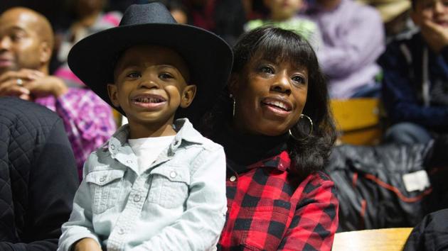 Daylen Lowe (L) and Leora Spillman (R) watch the calf roping competition during the MLK Jr. African American Heritage Rodeo at the National Western Stock Show in Denver, Colorado. (Jason Connolly/AFP) Daylen Lowe (L) and Leora Spillman (R) watch the calf roping competition during the MLK Jr. African American Heritage Rodeo at the National Western Stock Show in Denver, Colorado. (Jason Connolly/AFP)