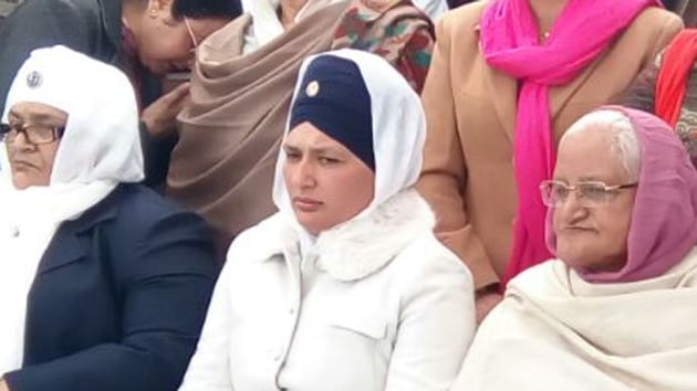 Rajdeep Kaur, sister of Rocky (centre with blue turban) at a rally in Fazilka on Tuesday.(HT Photo)