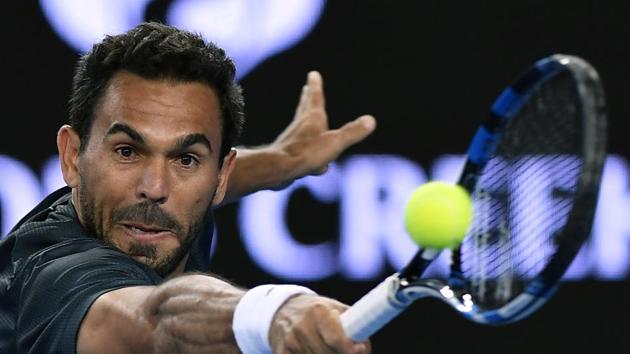 Victor Estrella Burgo put up a good fight but he could not match the power and accuracy of Tomic. (AP)