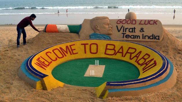 Sudarsan Pattnaik creates a sand sculpture at Puri beach of Odisha on Tuesday to welcome Indian cricket team to Odisha for 2nd series match against England. (PTI)