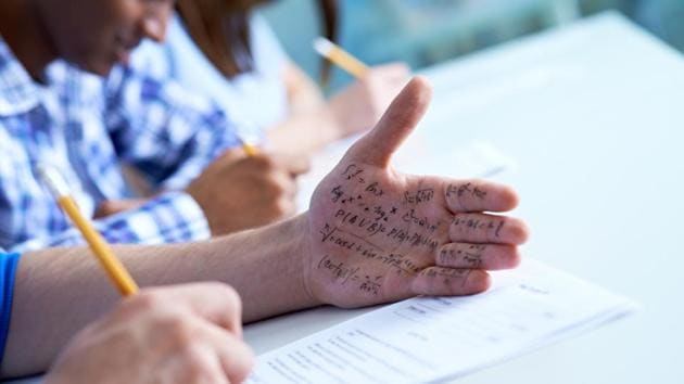 The principal and teachers of a college in Amreli, Gujarat, have been fined for not taking action against students indulging in mass cheating in an exam.(Getty Images/iStockphoto)