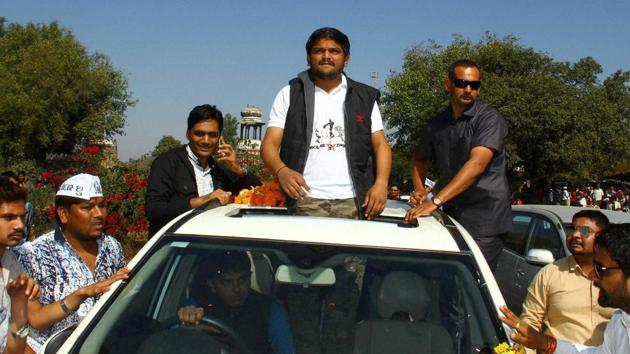 Patidar Anamat Andolan Samiti president Hardik Patel arrives with his supporters for a rally in Gujarat’s Himmatnagar on Tuesday. (PTI Photo) Patidar Anamat Andolan Samiti president Hardik Patel arrives with his supporters for a rally in Gujarat’s Himmatnagar on Tuesday. (PTI Photo)