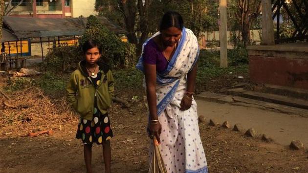 Widow of slain SPO Dhanai Kisku's wife and daughter in Mosabani of East Singhbum. (B Vijay Murty/HT Photo) Widow of slain SPO Dhanai Kisku's wife and daughter in Mosabani of East Singhbum. (B Vijay Murty/HT Photo)