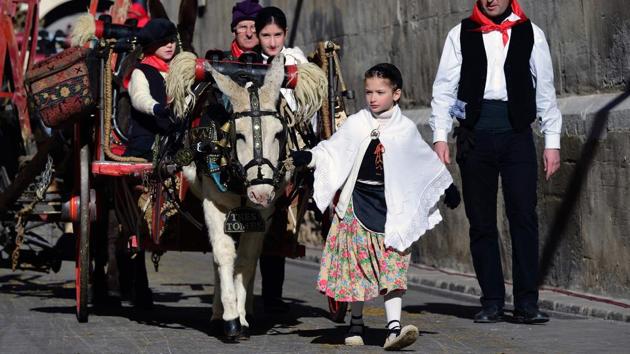 Residents in traditional dress parade in Vilanova i la Geltru, near Barcelona, marking San Anton Abad's Day (Saint Anthony), the patron saint of animals. (Lluis Gene/AFP) Residents in traditional dress parade in Vilanova i la Geltru, near Barcelona, marking San Anton Abad's Day (Saint Anthony), the patron saint of animals. (Lluis Gene/AFP)