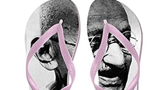 Amazon was selling flip-flops with Mahatma Gandhi’s image.(Photo via Amazon.com)