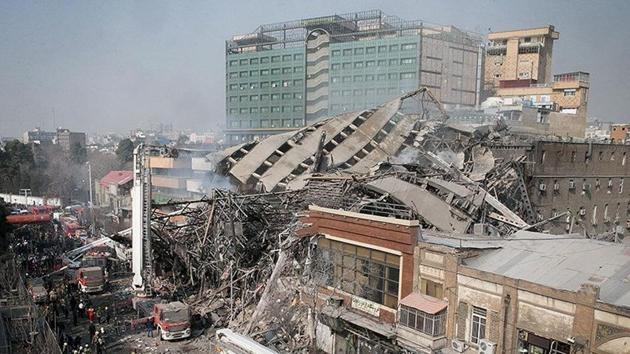 Iran's oldest high-rise seen after the collapse in downtown Tehran. (REUTERS) Iran's oldest high-rise seen after the collapse in downtown Tehran. (REUTERS)