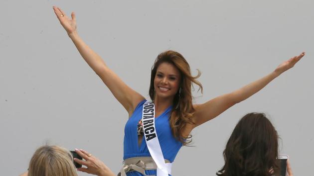 Miss Universe contestant Carolina Duran of Costa Rica poses from the yacht Happy Life. (AP) Miss Universe contestant Carolina Duran of Costa Rica poses from the yacht Happy Life. (AP)