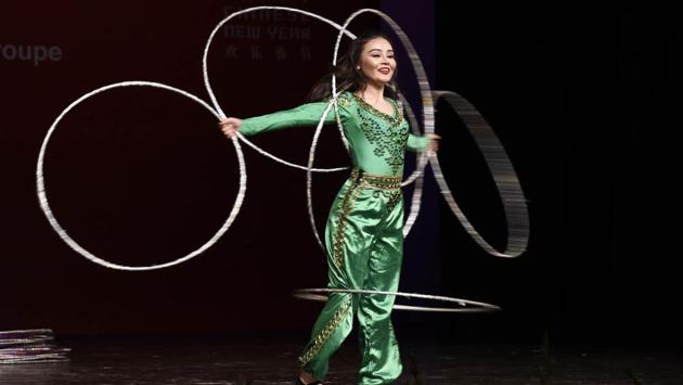 A member of Xinjiang Art Theatre song and Dance troupe performs Acrobatics Shaking Hula Hoops. Whereas, India China Economic and Cultural Council (ICEC), established in 2003 is an autonomous organization which works towards enhancing bilateral relations between India and China. (Arvind Yadav/HT PHOTO) A member of Xinjiang Art Theatre song and Dance troupe performs Acrobatics Shaking Hula Hoops. Whereas, India China Economic and Cultural Council (ICEC), established in 2003 is an autonomous organization which works towards enhancing bilateral relations between India and China. (Arvind Yadav/HT PHOTO)