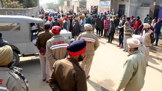 Police force was deployed in Bhai Bakhtaur village as residents gathered in protest on Thursday.(Sanjeev Kumar/HT Photo)