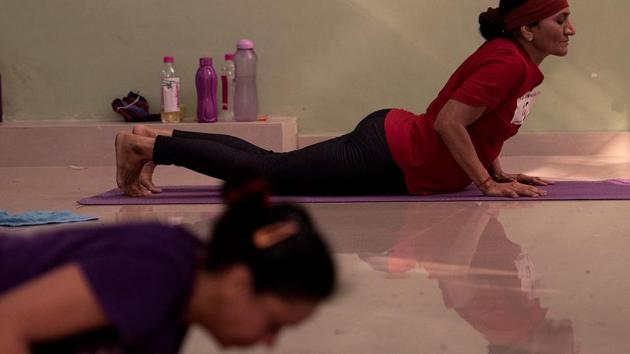 Sun Salutation or Surya Namaskar is a yoga routine based on a sequence of asanas (postures). (Satish Bate/HT PHOTO) 