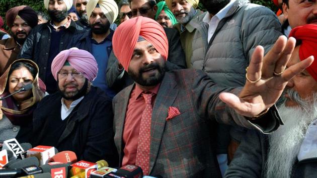 Punjab Pradesh Congress Committee president Amarinder Singh and Congress candidate and a former BJP MP Navjot Singh Sidhu during a joint press conference in Amritsar on Thursday. (PTI) Punjab Pradesh Congress Committee president Amarinder Singh and Congress candidate and a former BJP MP Navjot Singh Sidhu during a joint press conference in Amritsar on Thursday. (PTI)
