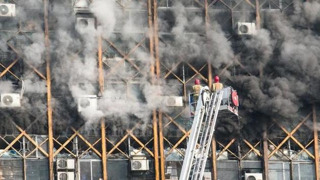 Firefighters try to put out fire in a blazing high-rise building in Tehran, Iran on Thursday. (Reuters) Firefighters try to put out fire in a blazing high-rise building in Tehran, Iran on Thursday. (Reuters)