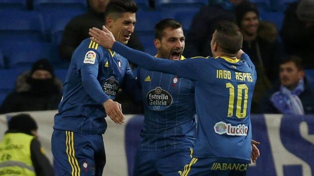 Celta Vigo's Pablo Hernandez (left), Jonny Castro and Iago Aspas (right) celebrate after scoring the winner against Real Madrid C.F. in their Copa del Rey quarterfinal match on Wednesday. (REUTERS) Celta Vigo's Pablo Hernandez (left), Jonny Castro and Iago Aspas (right) celebrate after scoring the winner against Real Madrid C.F. in their Copa del Rey quarterfinal match on Wednesday. (REUTERS)