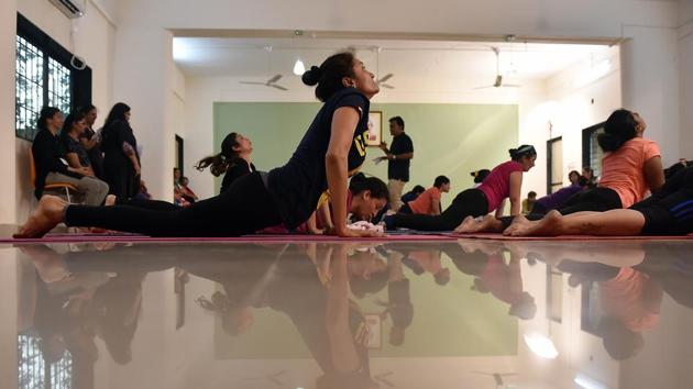 Thirty-three teachers completed their scheduled task of 350 Surya Namaskars. Fourteen teachers went on to complete 501 Surya Namaskars in 2 hours and 40 minutes.  (Pratham Gokhale/HT PHOTO) 