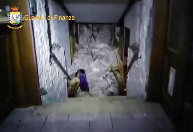 This image grab made from a video handout released by the Guardia di Finanza shows a wall of snow engulfing the inside of the Hotel Rigopiano, near the village of Farindola, on the eastern lower slopes of the Gran Sasso mountain.(AFP)